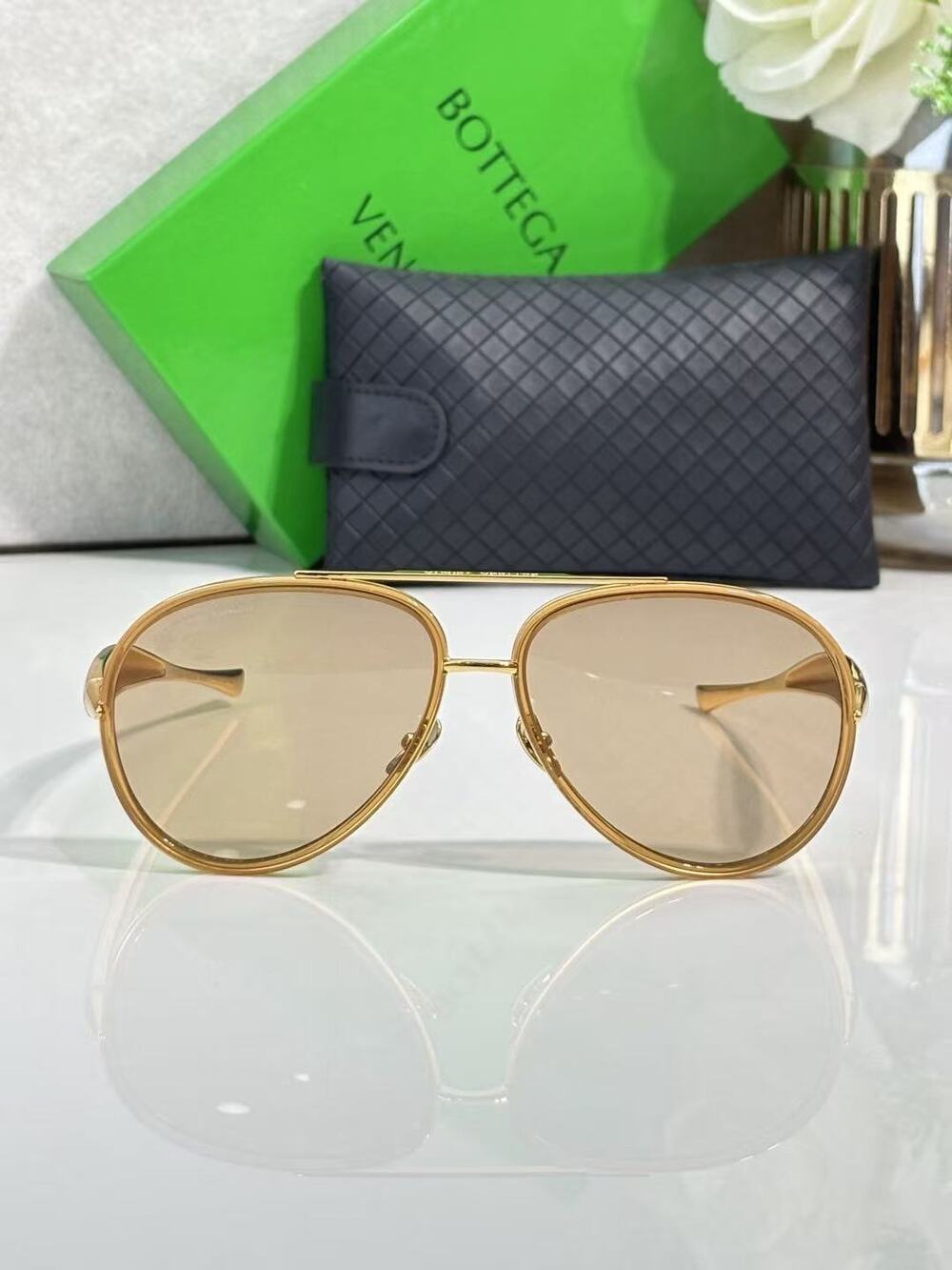 Bottega Veneta light purple sunglasses